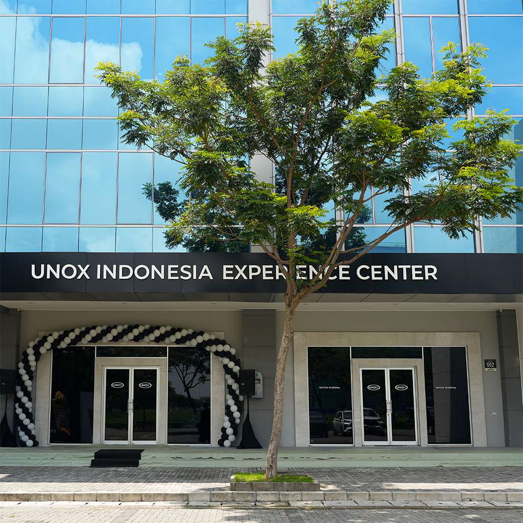 Large commercial building with Unox Indonesia Experience Centre written on the sign.